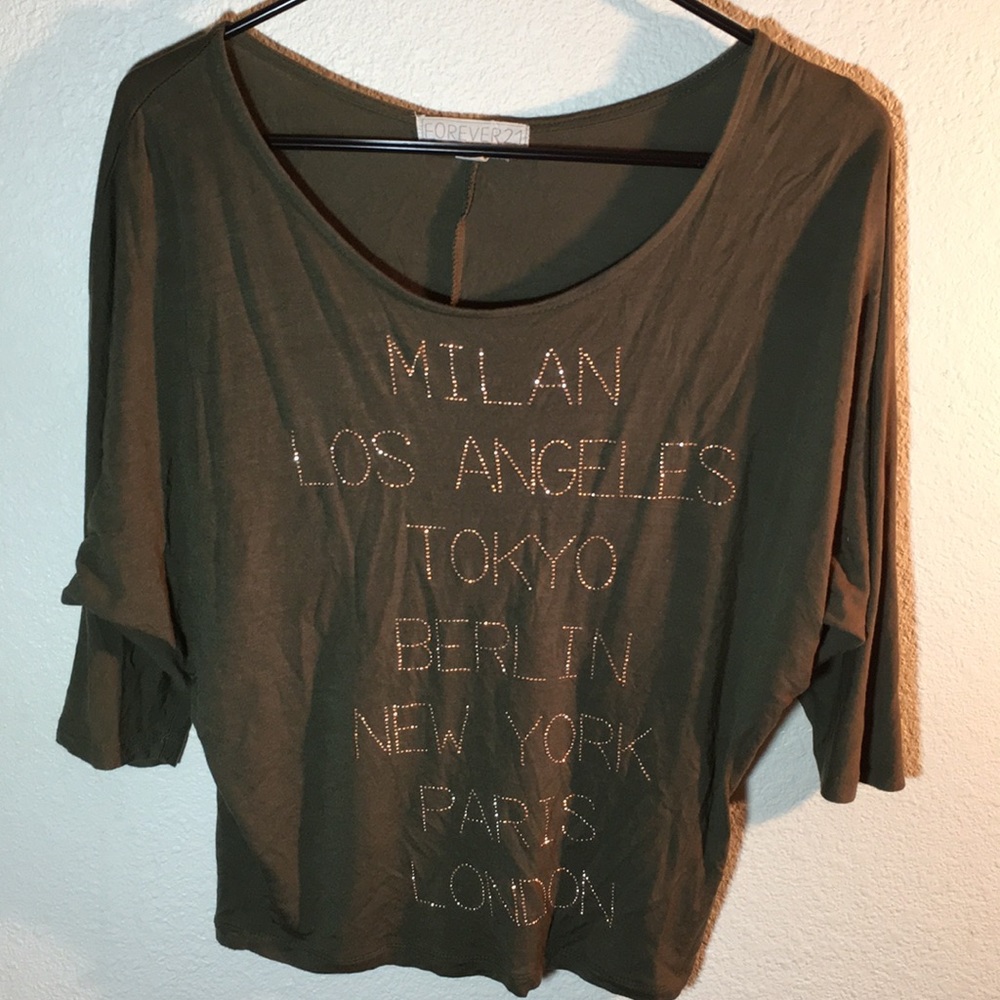Women’s olive shirt size small fits like a med